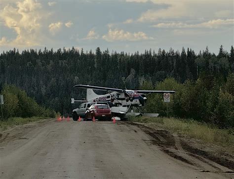 Floatplane in emergency highway landing near Fort Simpson.